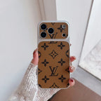 Multicolor monogram LV-style iPhone case close-up showing the patterned finish and fitted corners