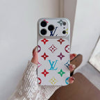 Multicolor monogram LV-style iPhone case close-up highlighting the material finish and protection